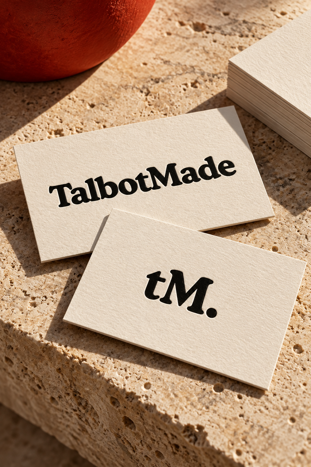 Ivory TalbotMade business cards on warm stone